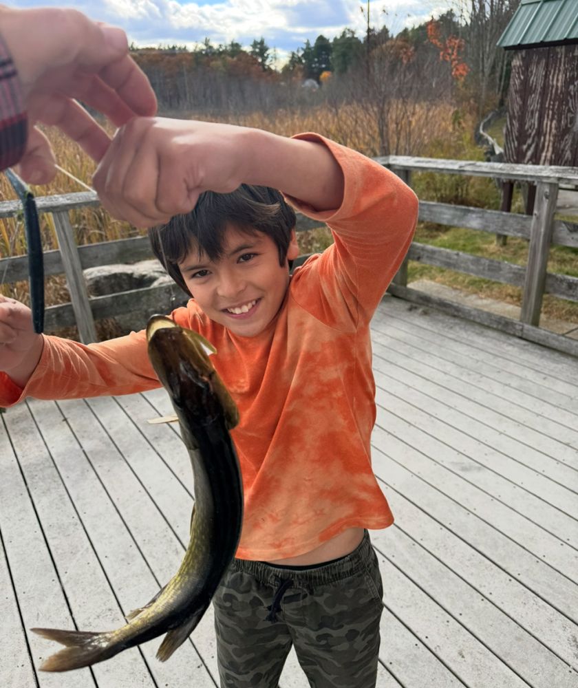 kid with fish