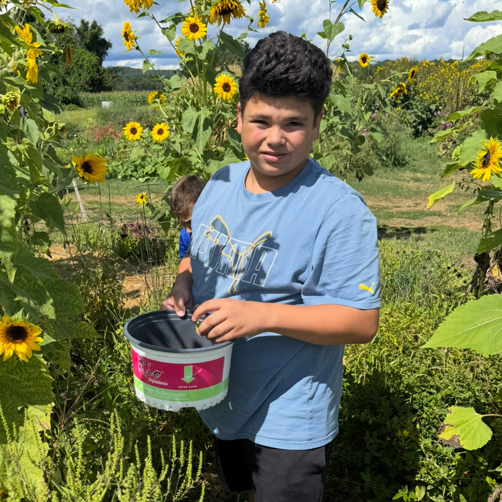 kids gardening at Parker Academy